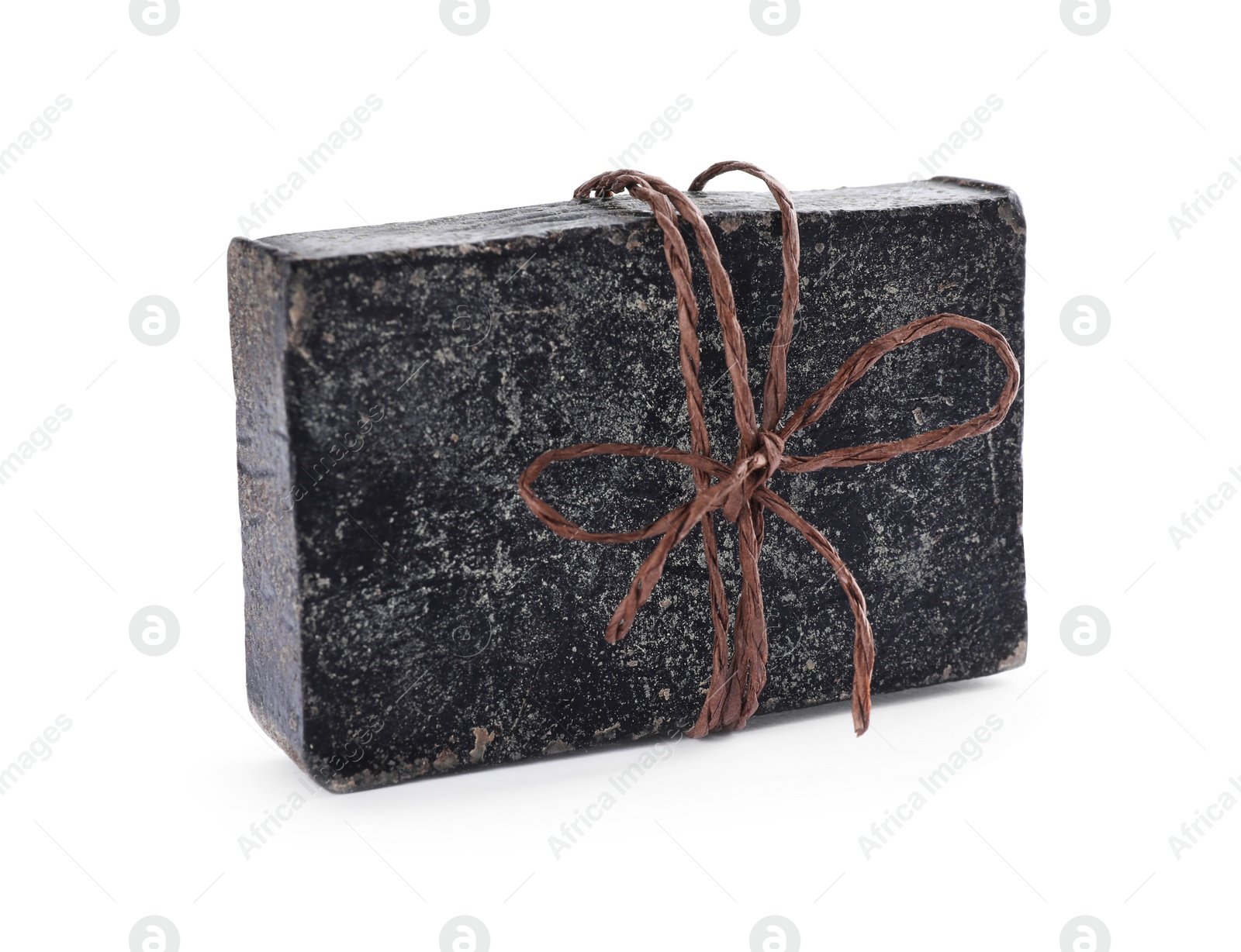 Photo of Tar soap bar isolated on white. Natural product