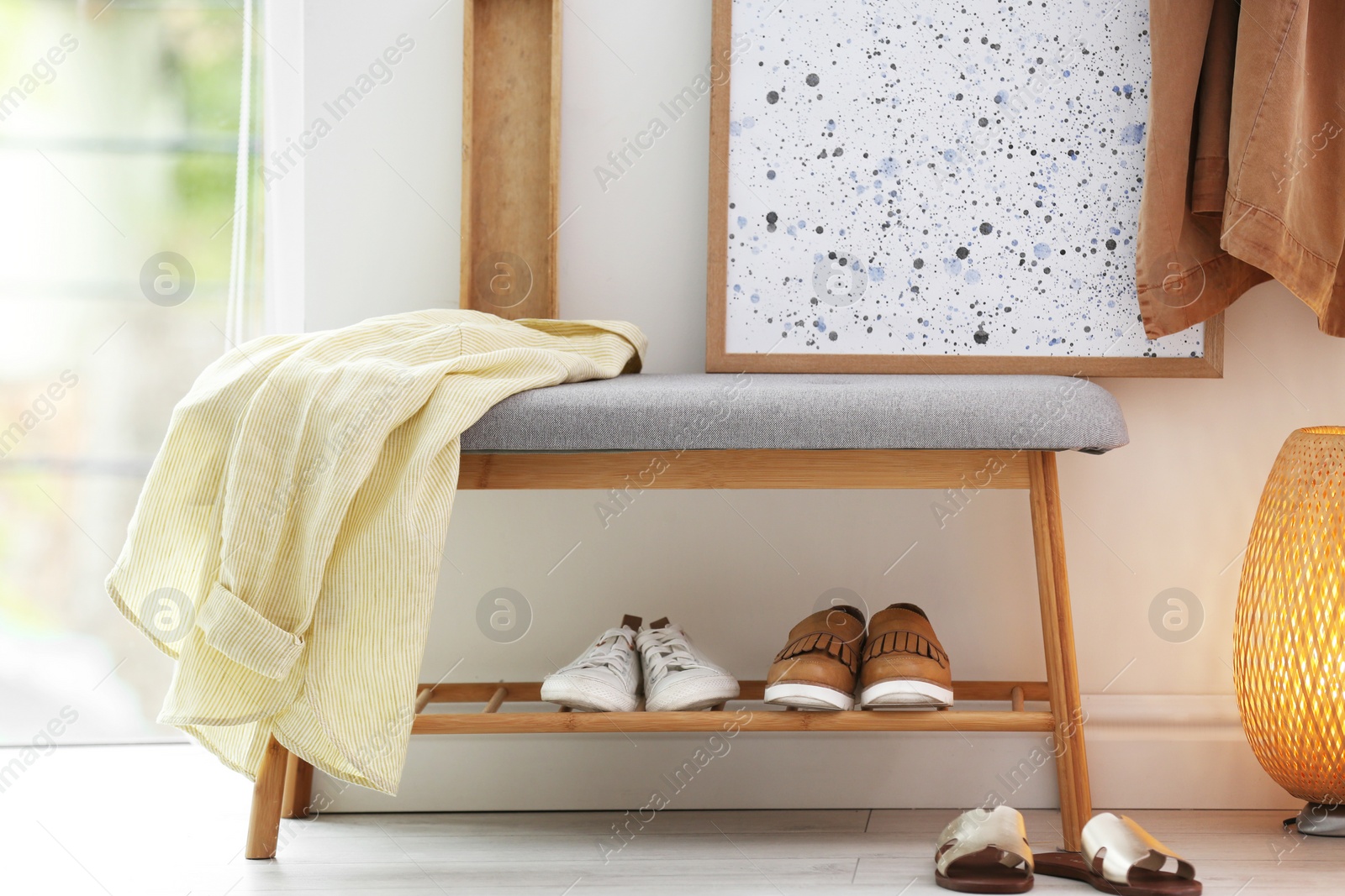 Photo of Modern hallway interior with shoe storage bench