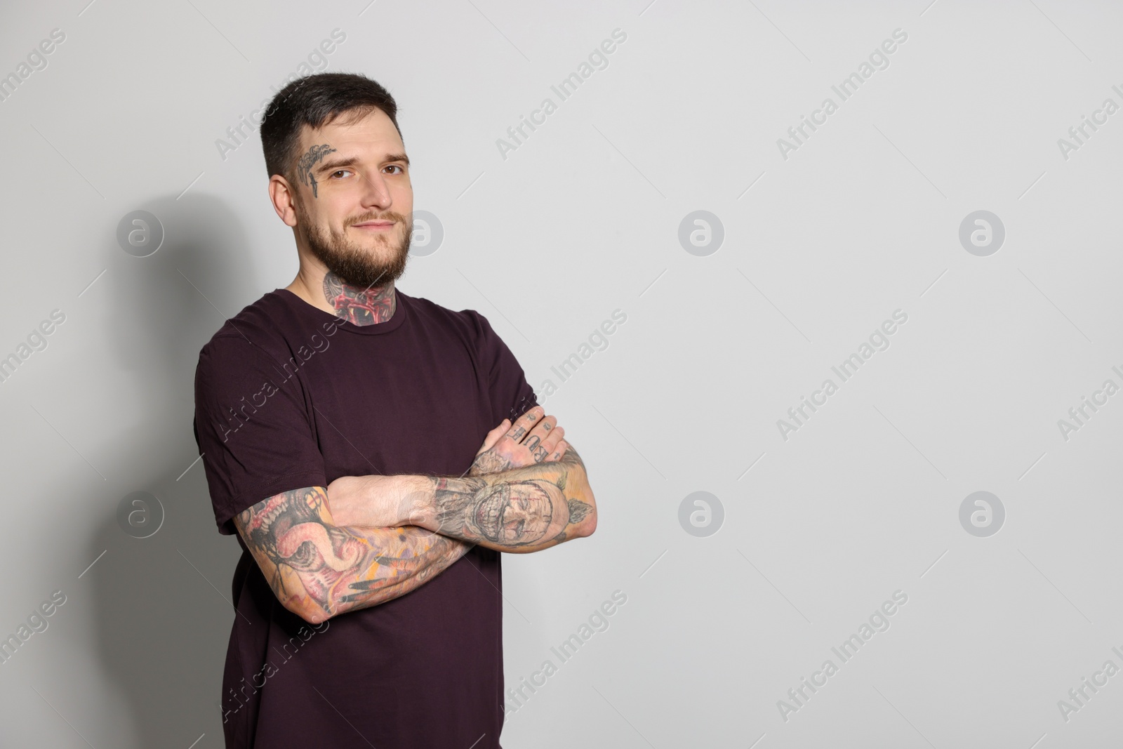 Photo of Portrait of hipster man on light grey background. Space for text