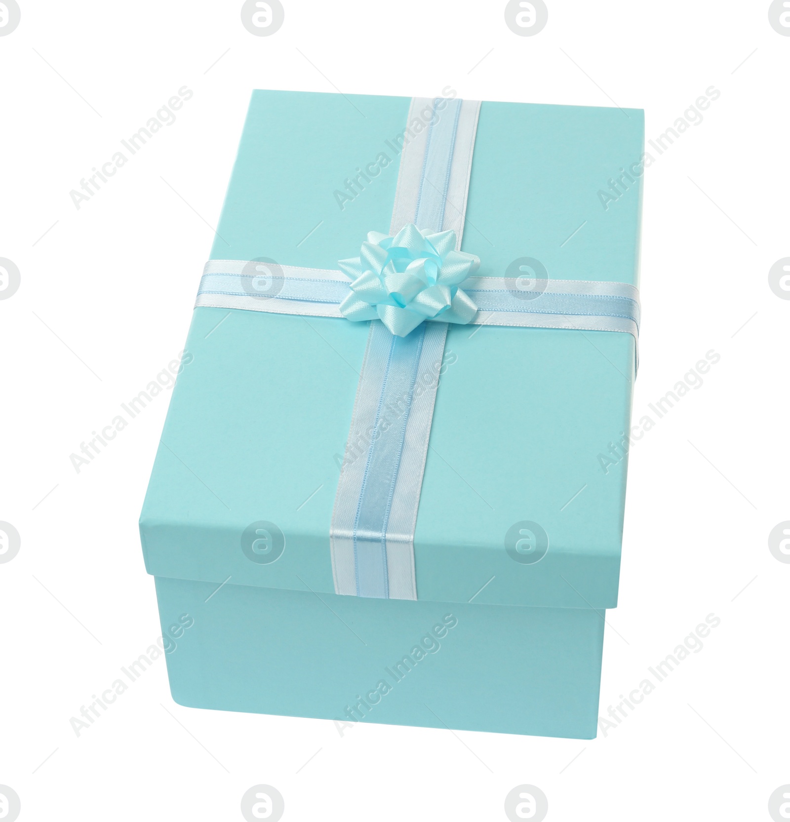 Photo of Light blue gift box with bow isolated on white