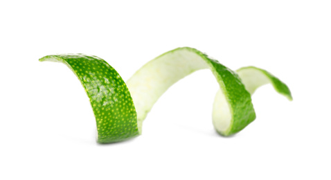 Peel of fresh ripe lime isolated on white