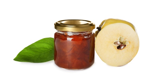 Delicious quince jam and fruits isolated on white