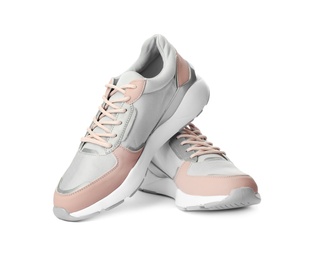 Photo of Pair of stylish sneakers on white background