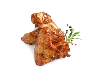 Photo of Delicious barbecued chicken wings on white background, top view
