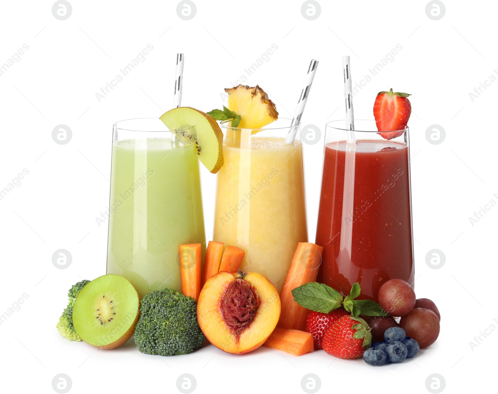 Photo of Glasses of delicious juices and fresh ingredients on white background