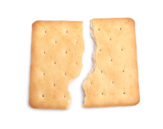 Photo of Crispy broken cracker isolated on white, top view