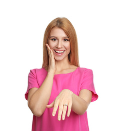 Photo of Happy woman with engagement ring on white background