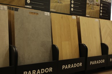 Many different samples of wooden flooring in store