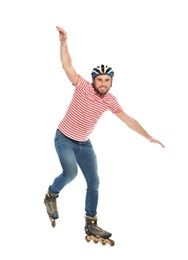 Photo of Young man with inline roller skates on white background
