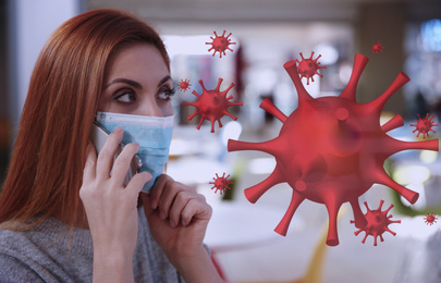Image of Woman with medical mask talking on phone indoors during coronavirus outbreak