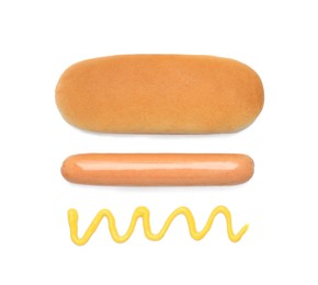 Photo of Bun, sausage and mustard isolated on white, top view. Ingredients for hot dog