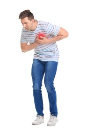 Photo of Young man having heart attack on white background
