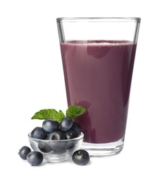 Photo of Glass of acai drink with berries on white background
