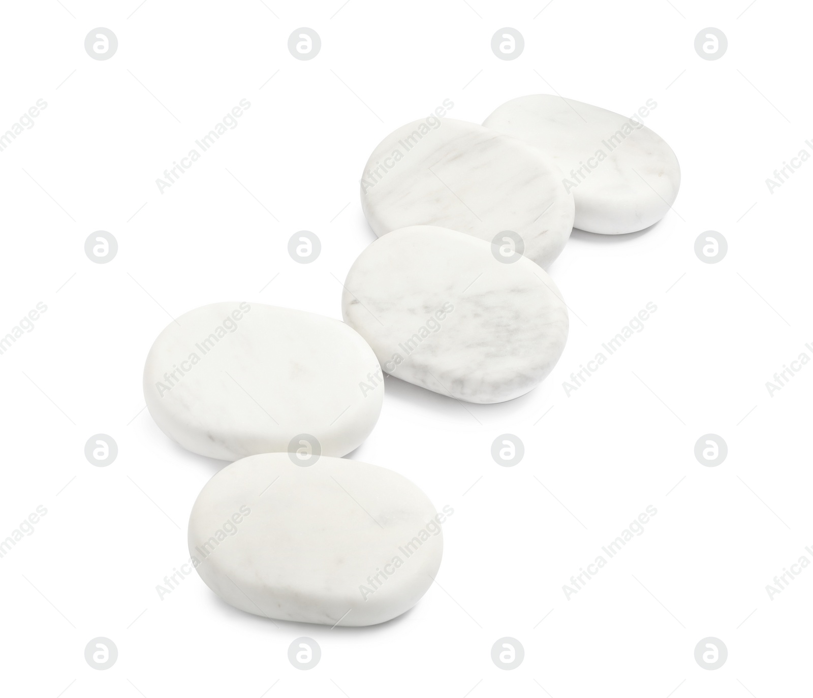 Photo of Group of marble stones on white background