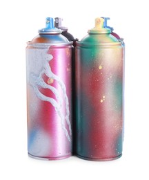 Photo of Different spray paint cans isolated on white