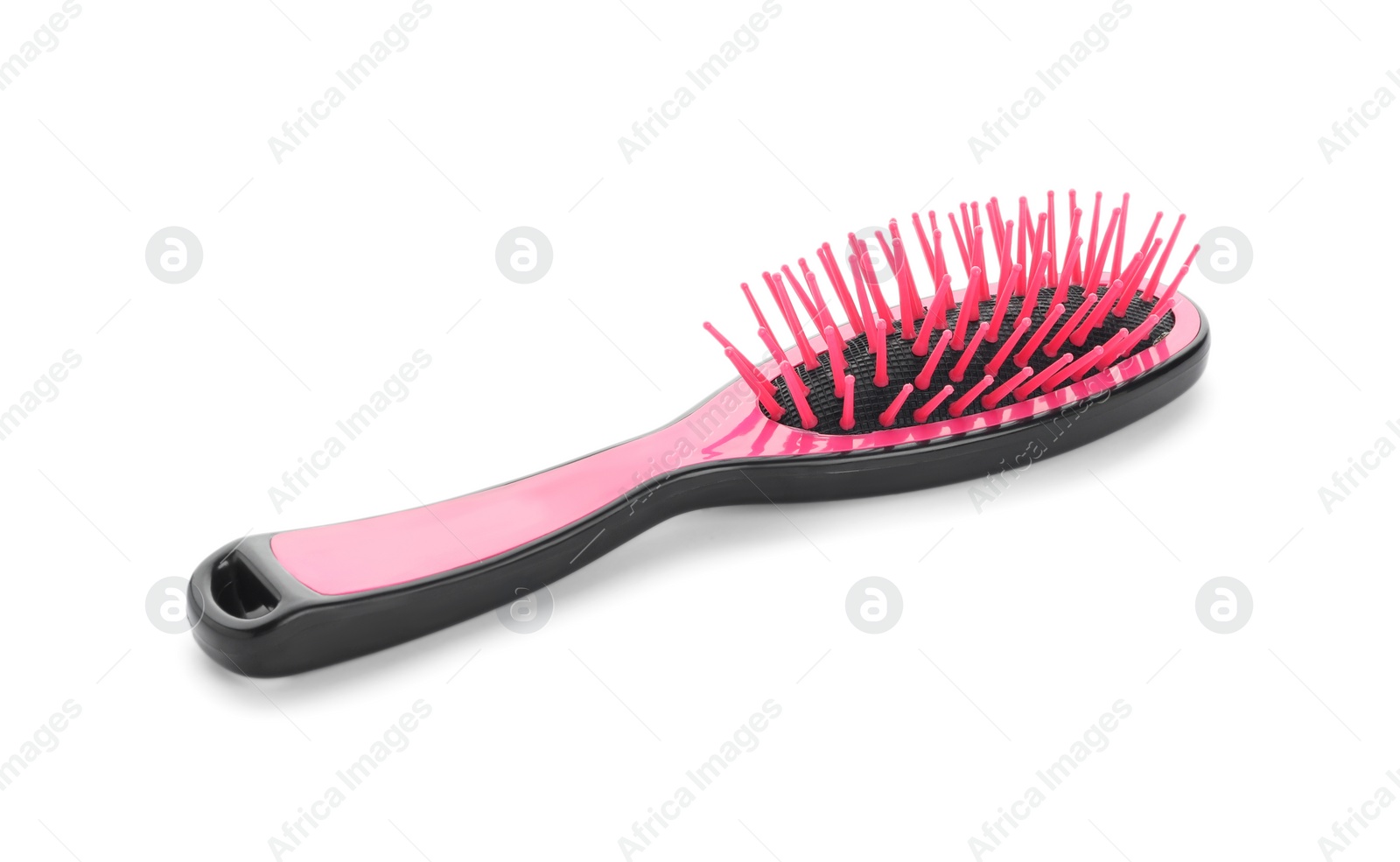 Photo of New modern hair brush isolated on white