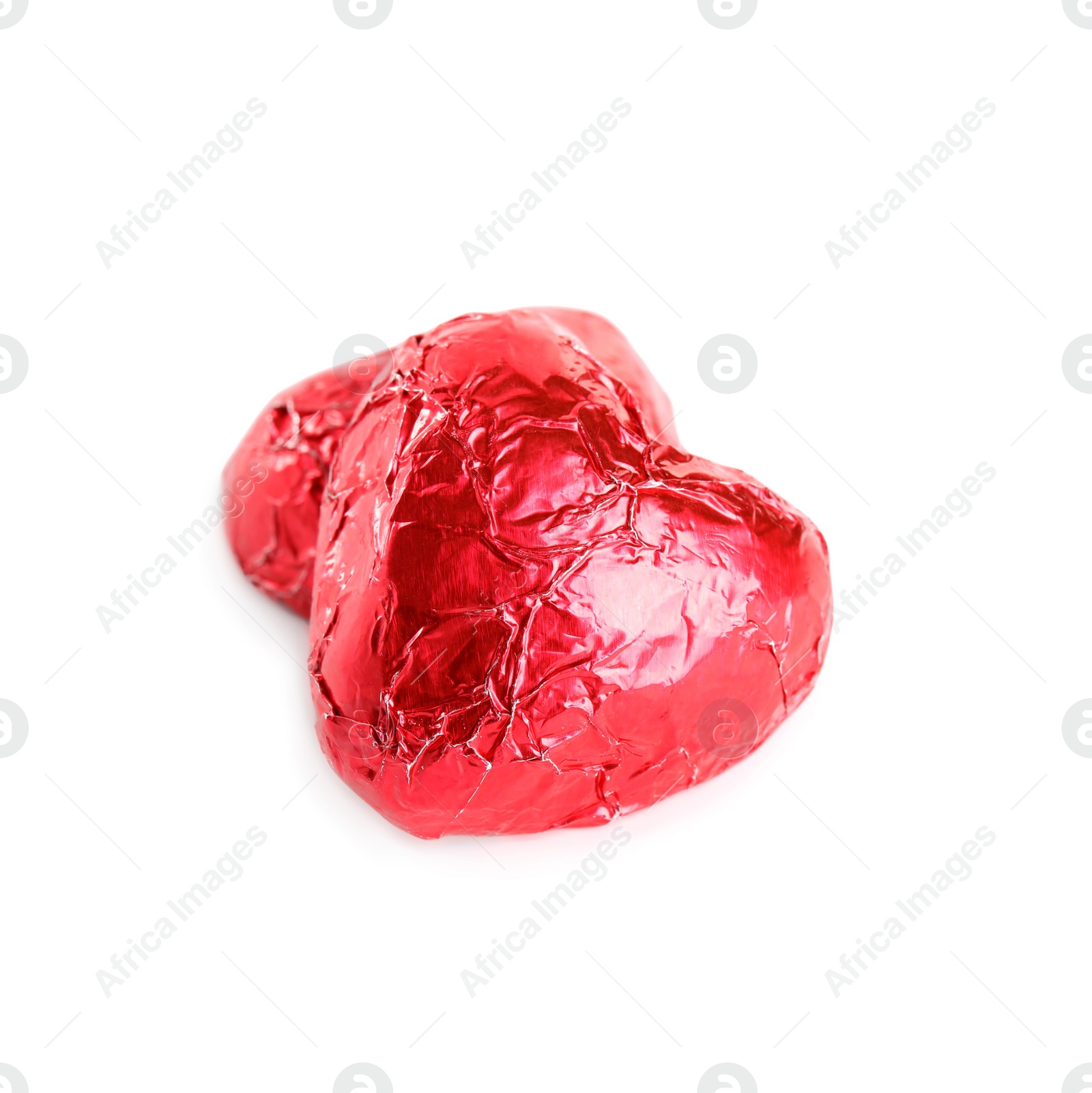 Photo of Heart shaped chocolate candies on white background