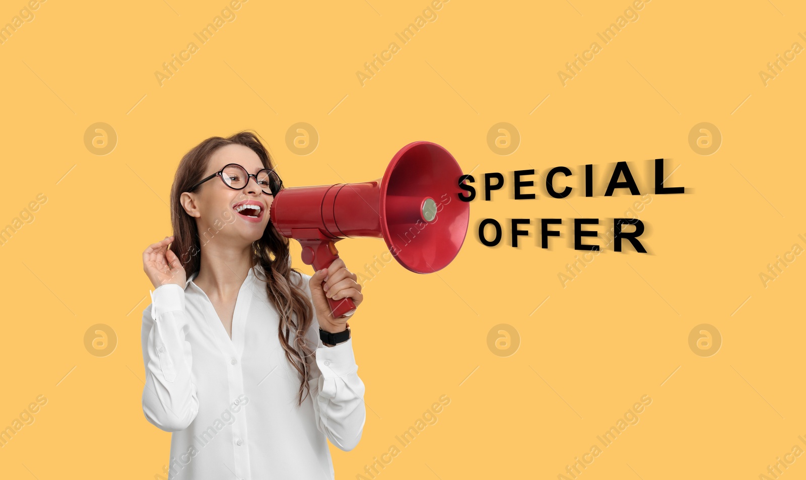 Image of Special offer. Young woman with megaphone on yellow background