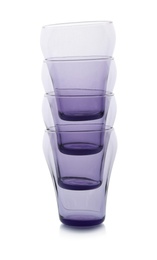 Photo of Stack of empty colorful glasses on white background