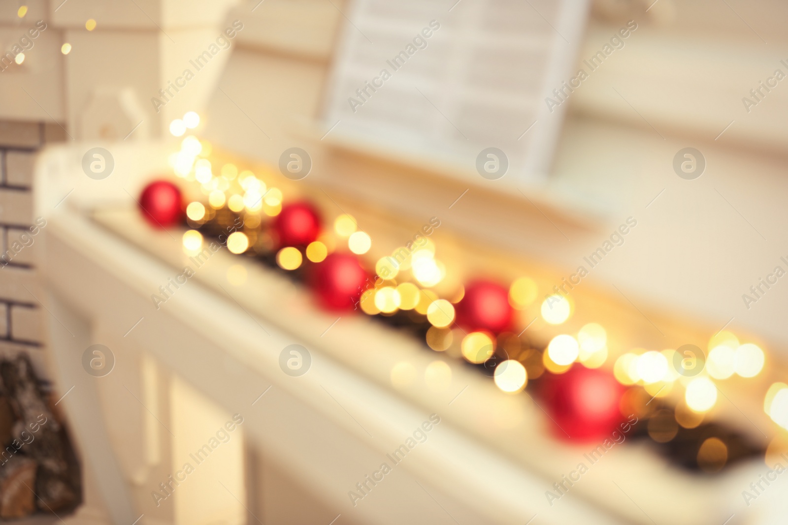 Photo of Blurred view of white piano with festive decor indoors, closeup. Christmas music