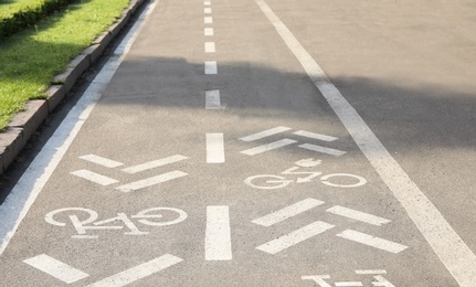 Photo of Bicycle lane with marking on asphalt road