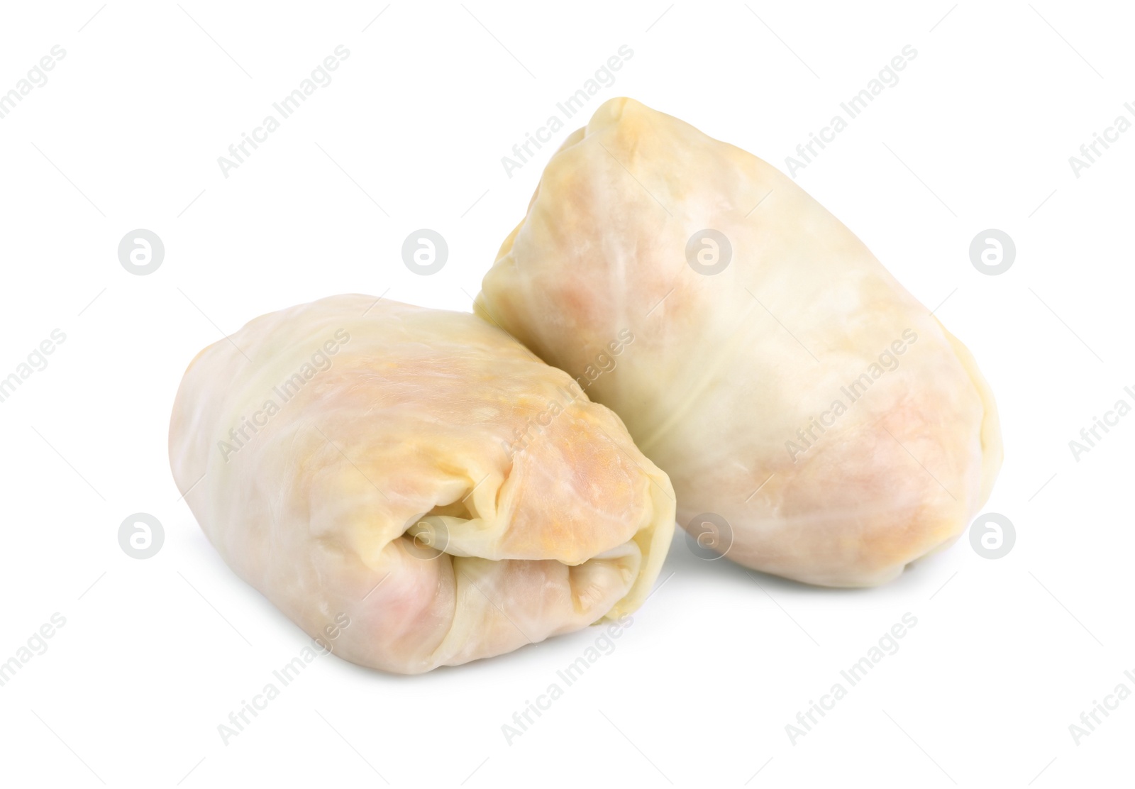 Photo of Uncooked stuffed cabbage rolls on white background