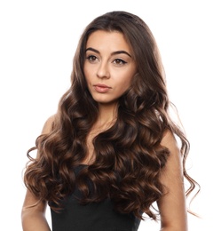 Photo of Beautiful woman with shiny wavy hair on white background