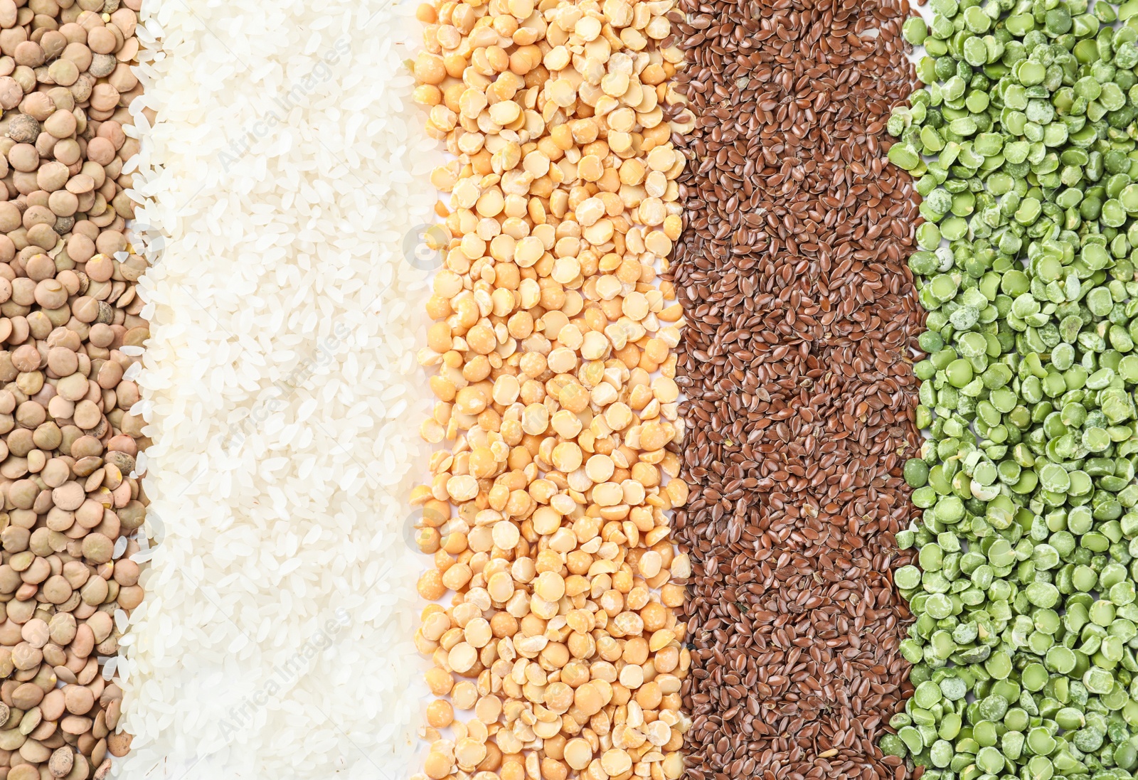 Photo of Different grains and cereals as background, top view