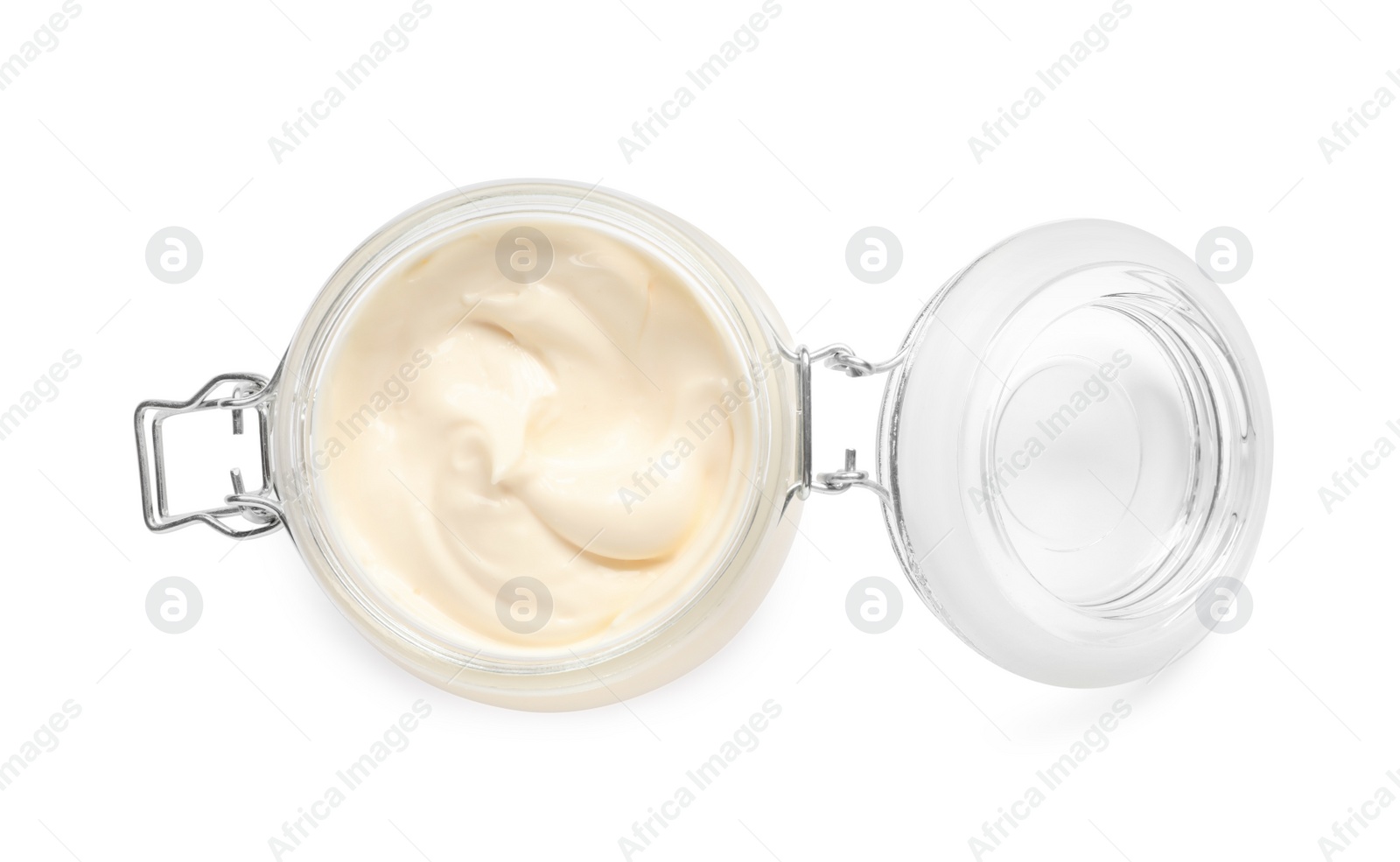 Photo of Mayonnaise in glass jar isolated on white, top view