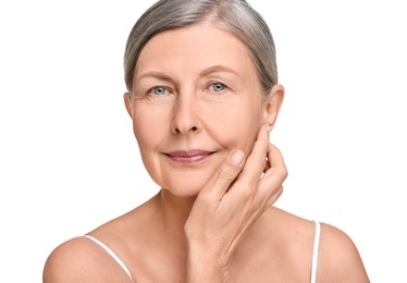 Photo of Portrait of senior woman with aging skin on white background. Rejuvenation treatment