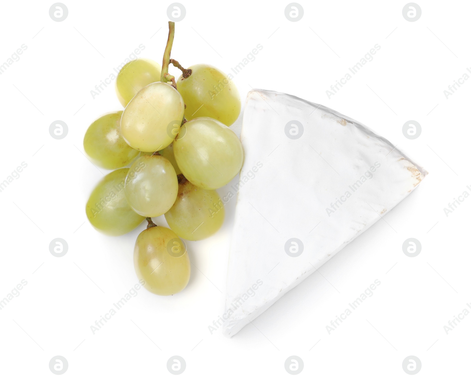 Photo of Tasty brie cheese with grapes on white background, top view