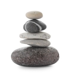 Photo of Stack of stones on white background. Harmony and balance concept