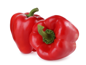 Ripe red bell peppers isolated on white