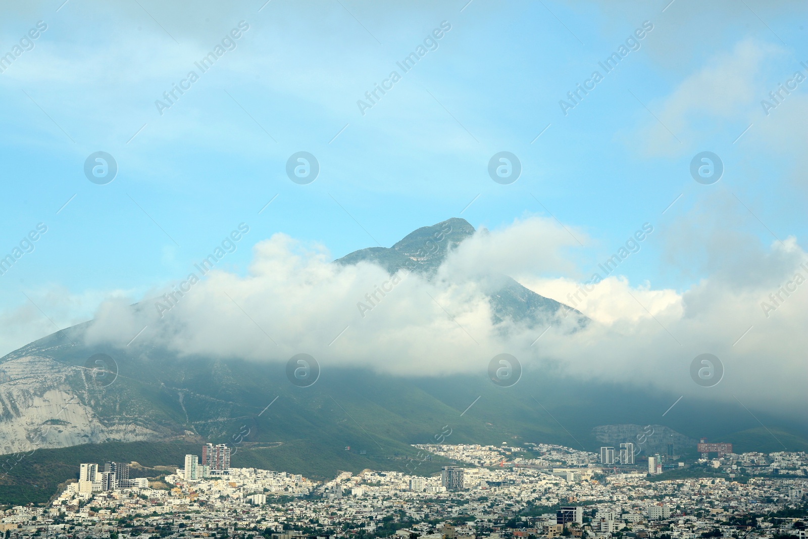 Photo of Picturesque view of beautiful cityscape near mountain