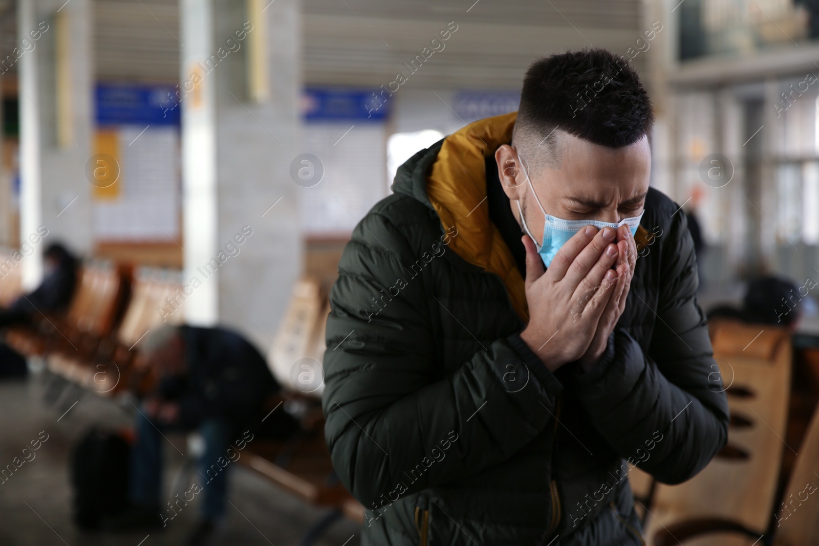 Photo of Man with disposable mask indoors. Virus protection