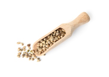 Photo of Scoop with hemp seeds on white background, top view
