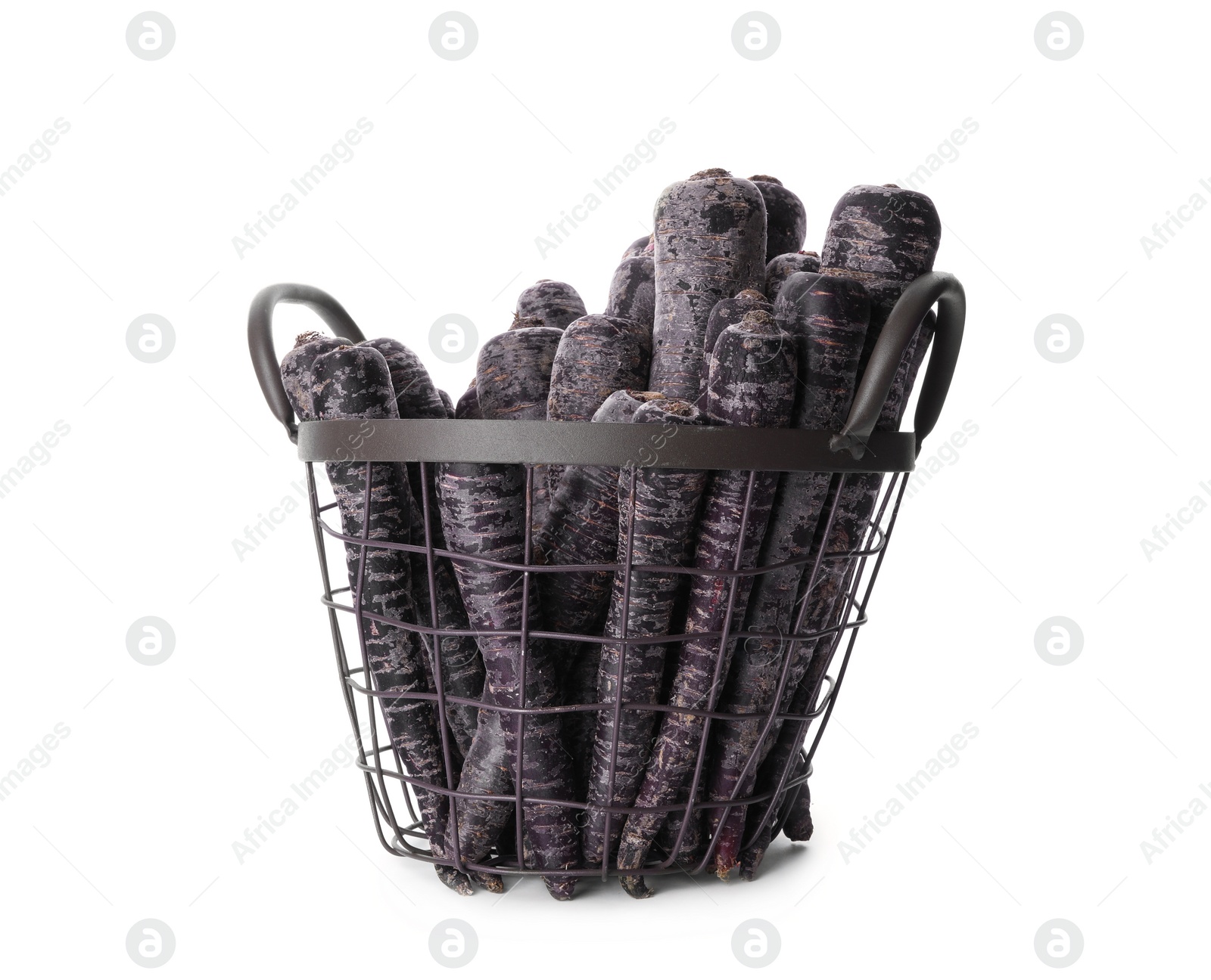 Photo of Raw black carrots in metal basket isolated on white