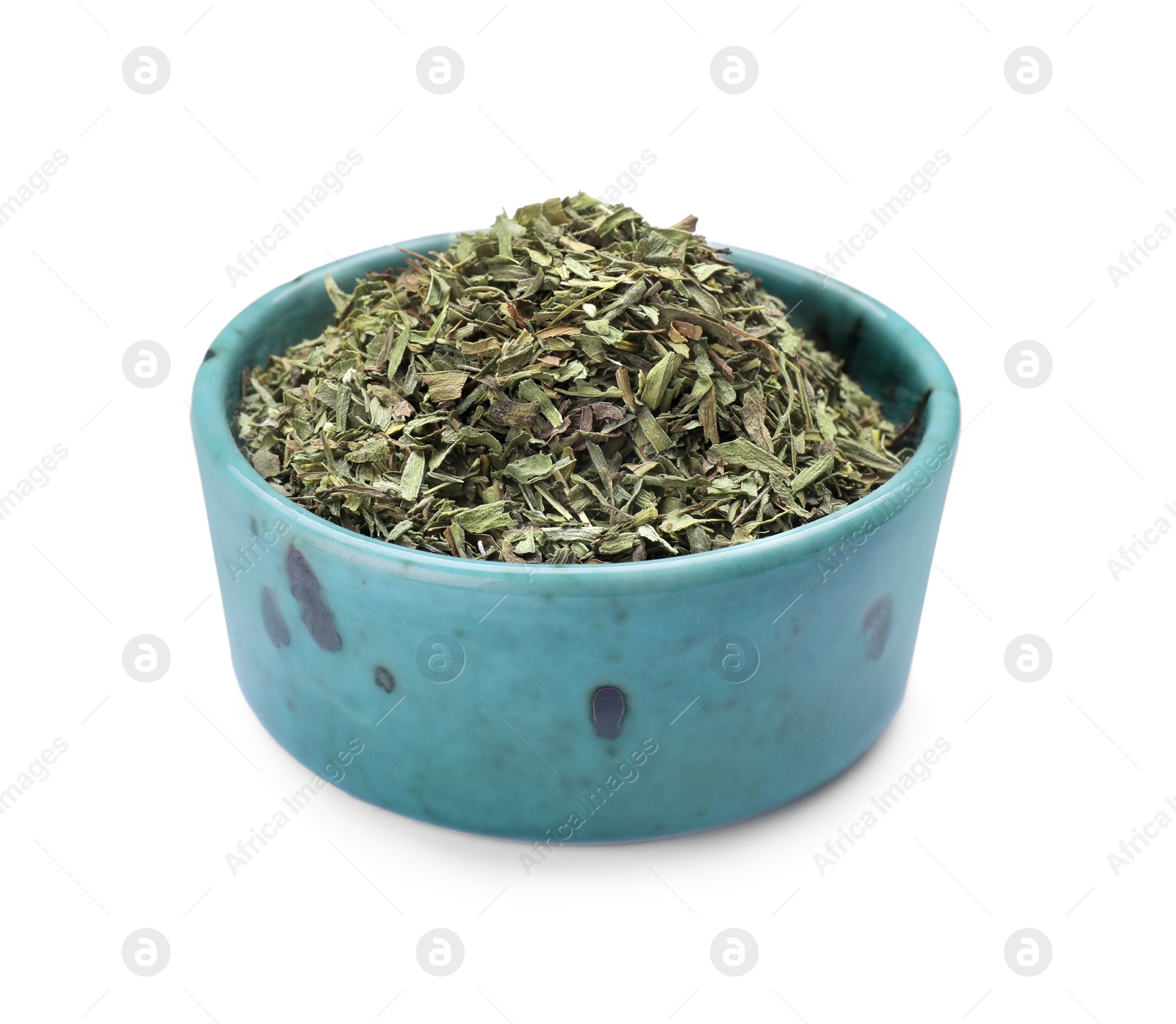 Photo of Bowl of dry tarragon isolated on white