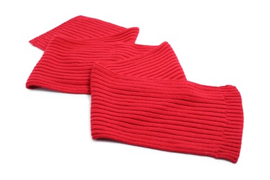 Photo of One red knitted scarf on white background