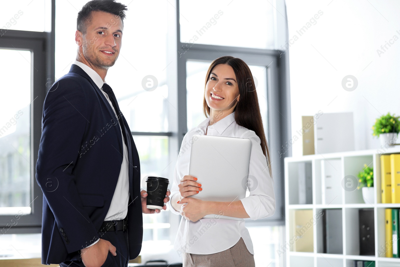 Photo of Portrait of business trainers in office wear at workplace