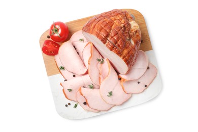 Photo of Delicious sliced ham with thyme, peppercorns and tomato isolated on white, top view