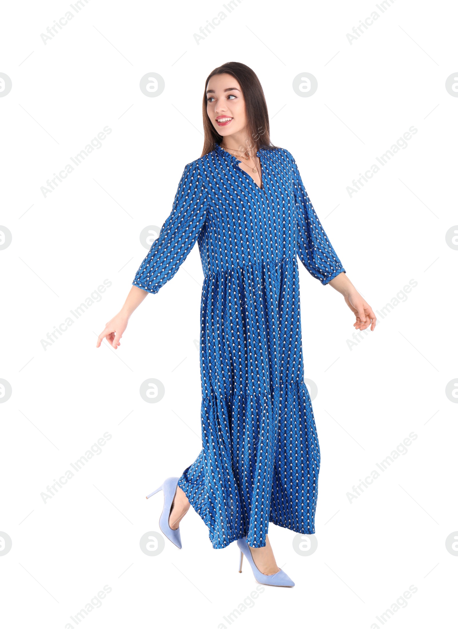 Photo of Portrait of beautiful young woman in stylish dress on white background