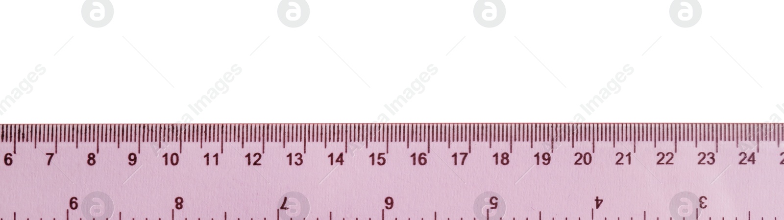 Photo of Ruler with measuring length markings in centimeters isolated on white, top view