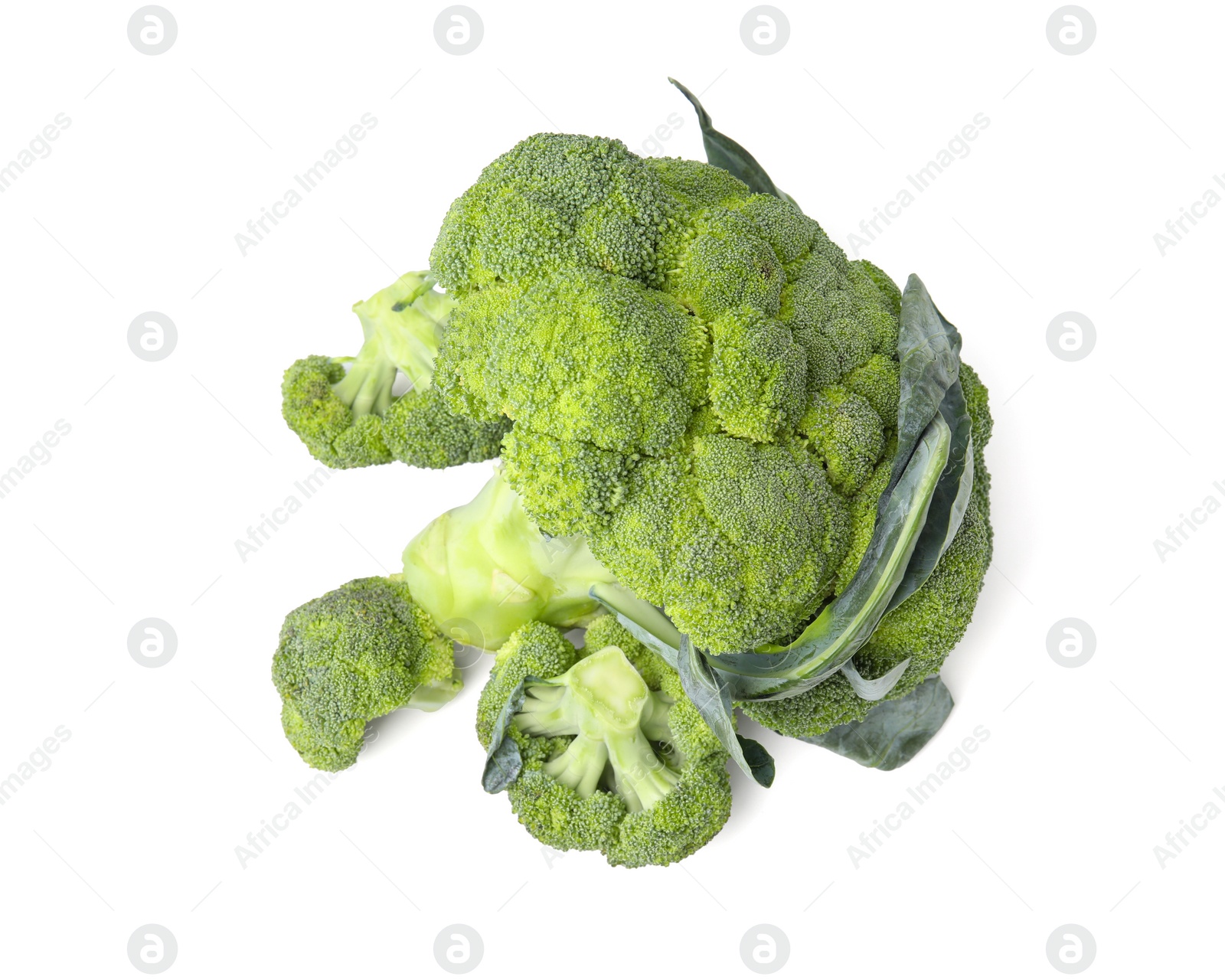 Photo of Pile of fresh raw green broccoli isolated on white, top view