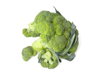 Pile of fresh raw green broccoli isolated on white, top view