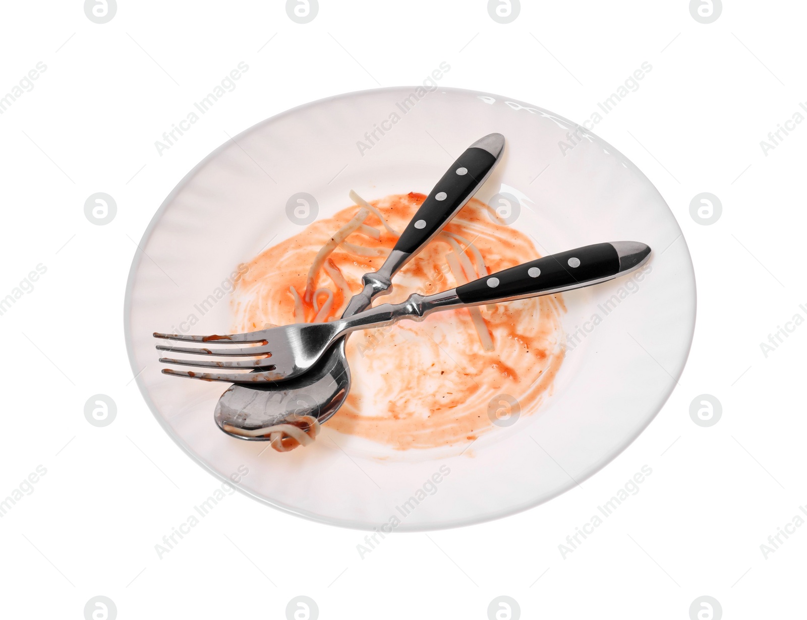 Photo of Dirty plate and cutlery on white background