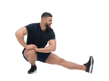 Photo of Man doing stretching on white background. Morning exercise