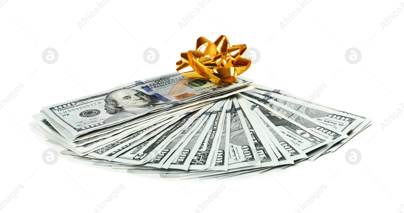 Photo of Fan of dollar banknotes with bow on white background