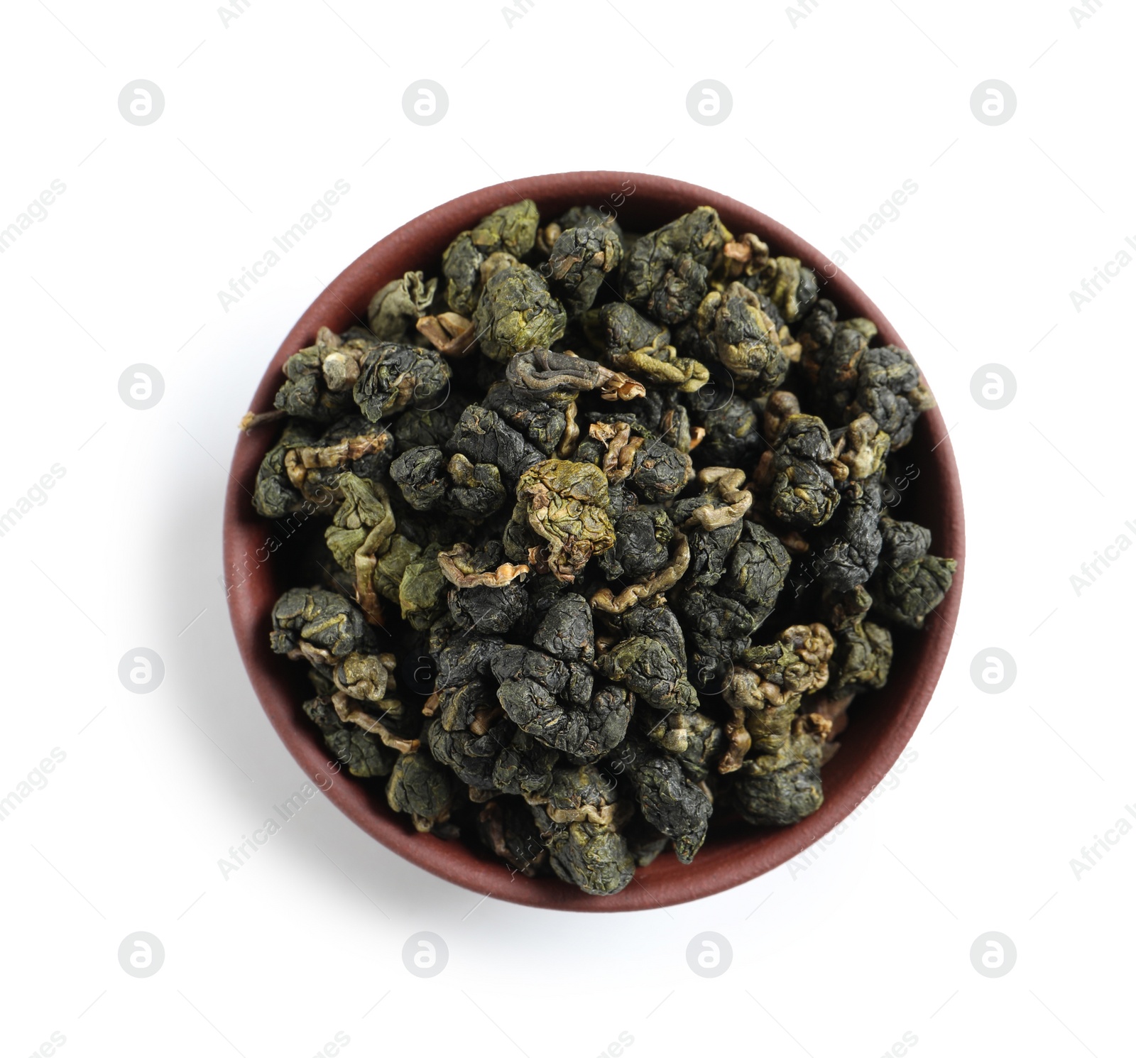 Photo of Bowl with Ali Shan Oolong tea on white background, top view