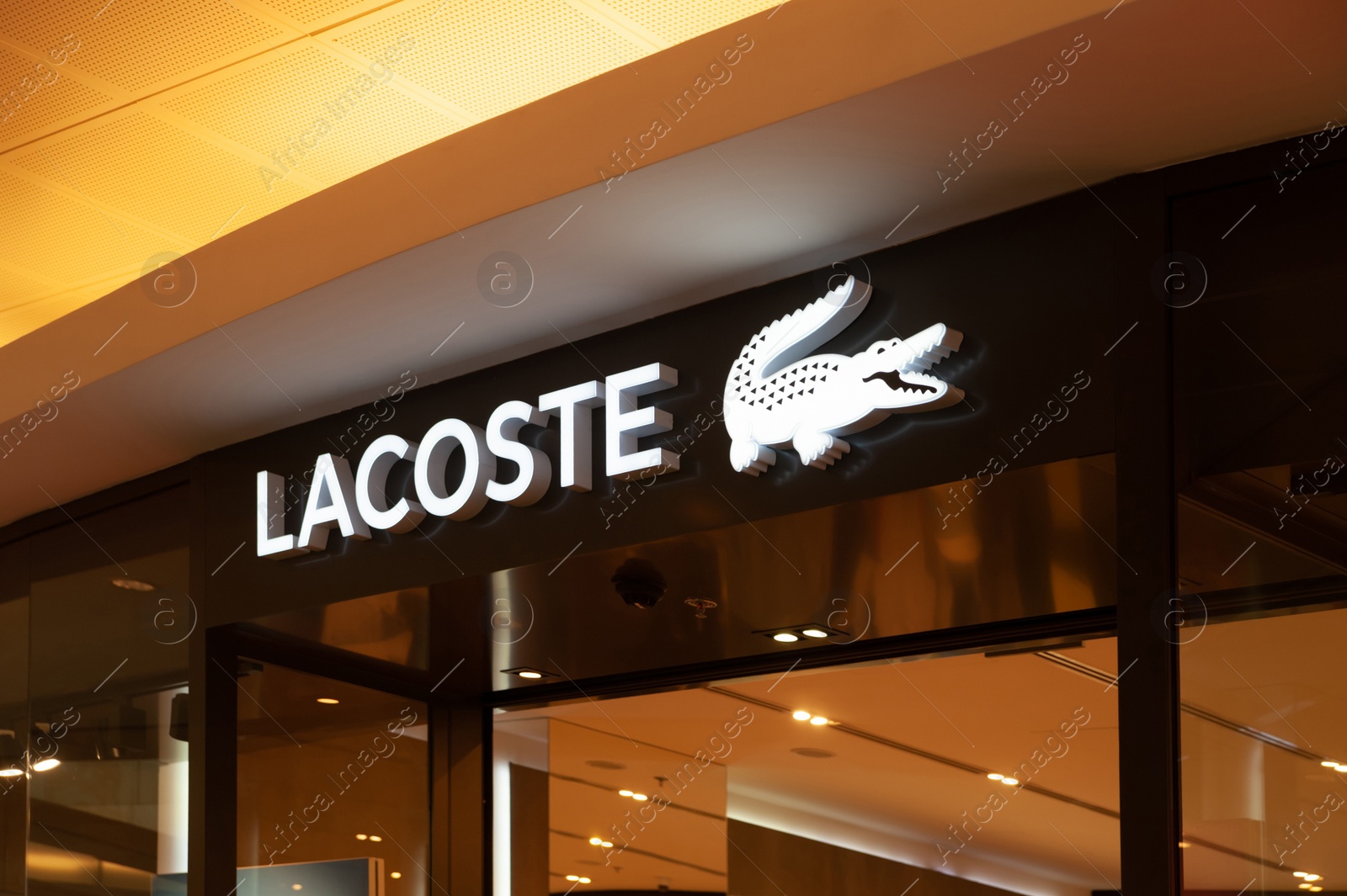 Photo of Warshaw, Poland - May 14, 2022: Lacoste fashion store in shopping mall